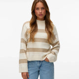 Luxe neutral sweater with oversized sleeves and quiet luxury winter fashion trend