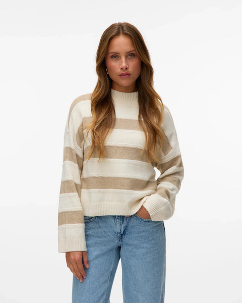 Luxe neutral sweater with oversized sleeves and quiet luxury winter fashion trend