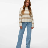 Women’s oversized striped sweater in ivory and beige for minimalist outfits, capsule wardrobes, and trendy seasonal layering.