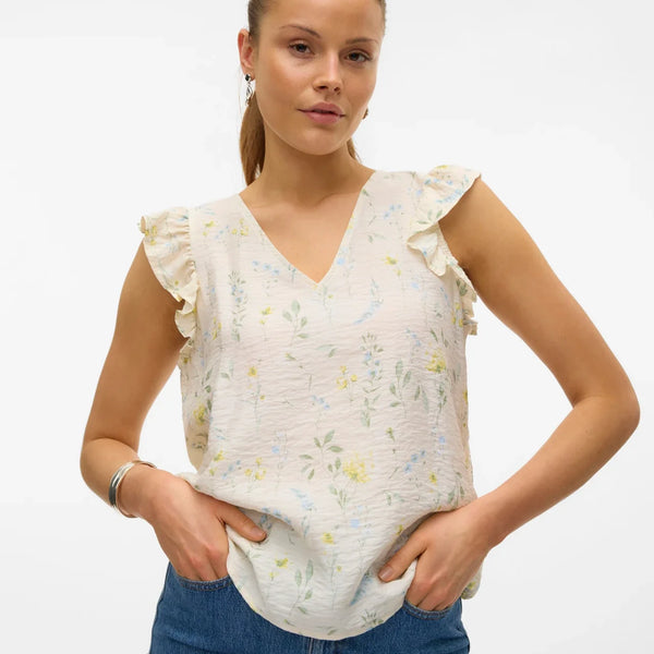 Chic floral V-neck top with flutter sleeve detailing and airy boho-inspired everyday styling.