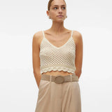 Women’s airy crochet knit cami featuring spaghetti straps, scalloped hemline, and lightweight texture for modern summer style.