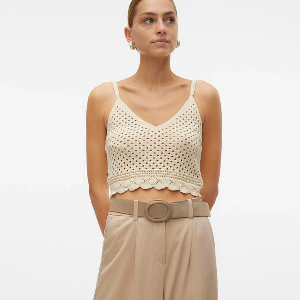 Women’s airy crochet knit cami featuring spaghetti straps, scalloped hemline, and lightweight texture for modern summer style.