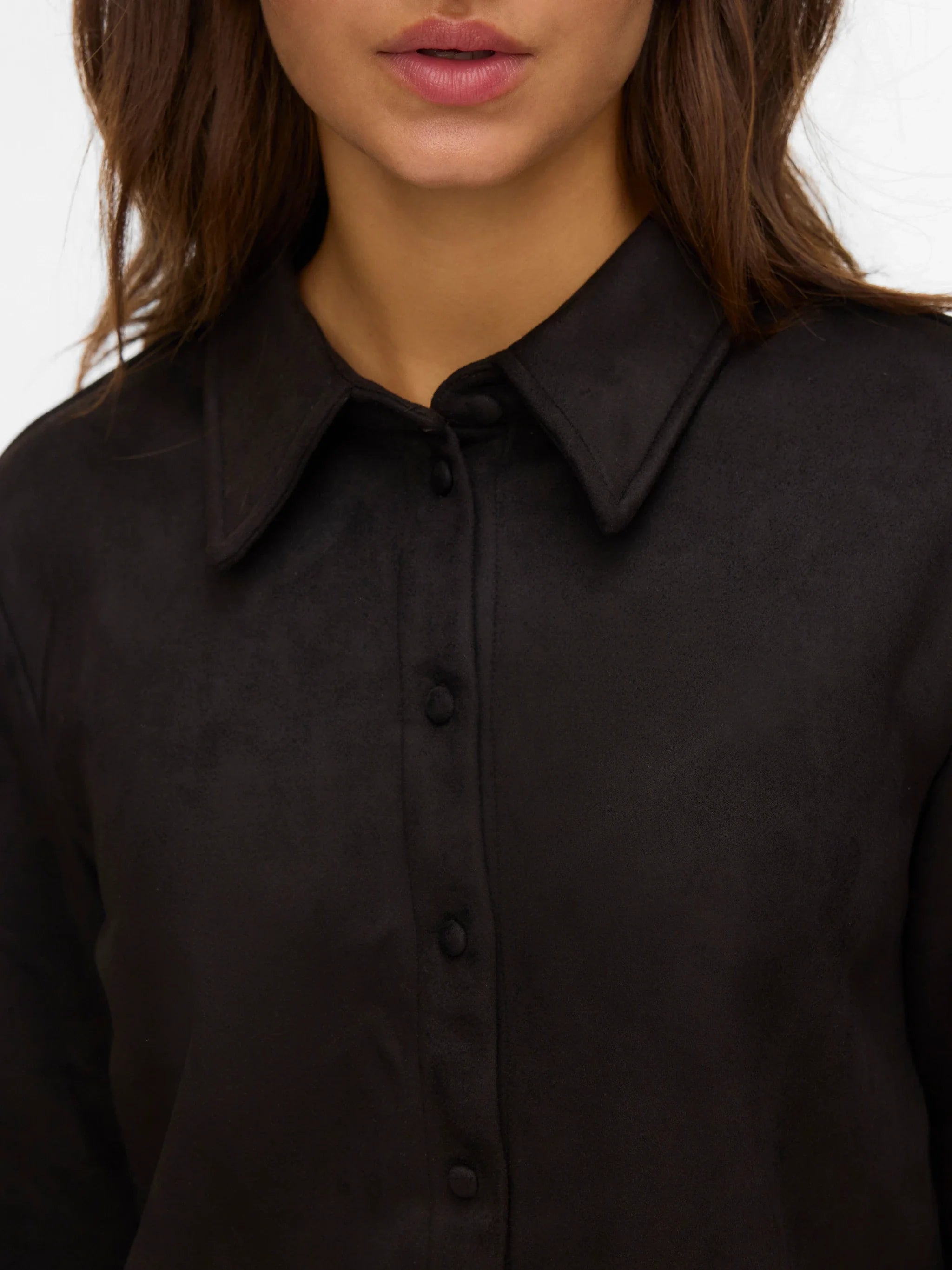 Women's timeless collared blouse with long sleeves and tonal button details for effortless day-to-night styling.