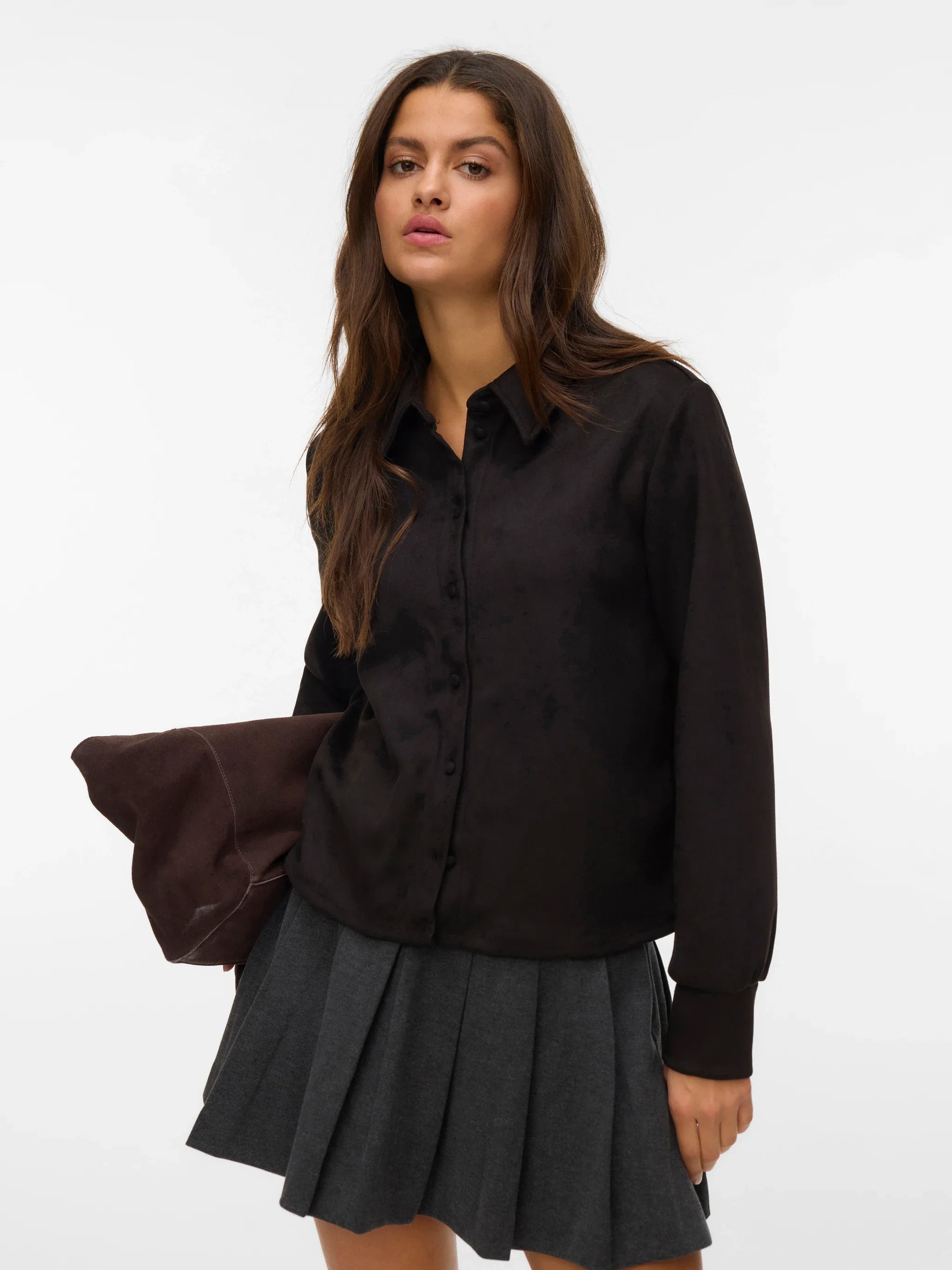Women's black long-sleeve collared top with button-front design for polished workwear and elevated casual style.