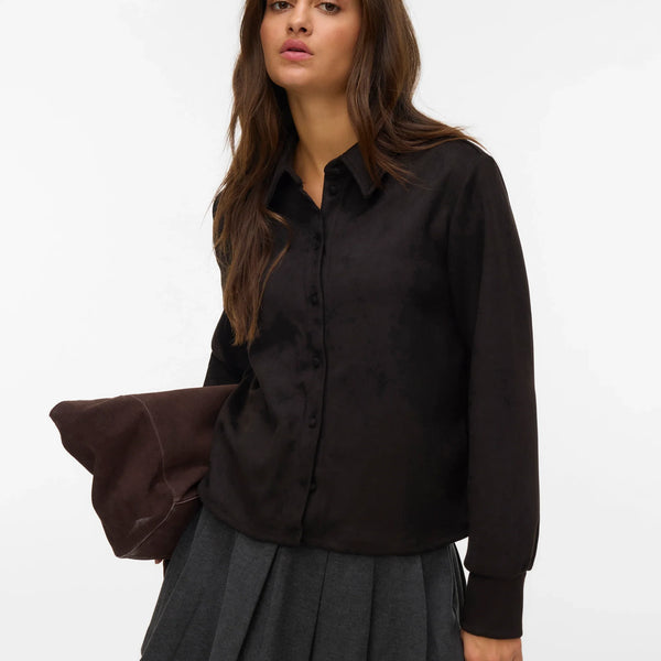 Women's black long-sleeve collared top with button-front design for polished workwear and elevated casual style.