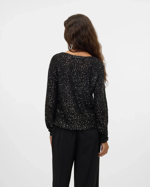 Women's black glitter top with long sleeves and relaxed fit, an elegant going-out top for parties and special occasions.