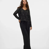 Black long-sleeve party top for women with all-over shimmer, perfect for date night, cocktails and festive occasions.