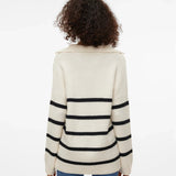 Contemporary women’s collared striped sweater with modern oversized silhouette and timeless monochrome appeal.