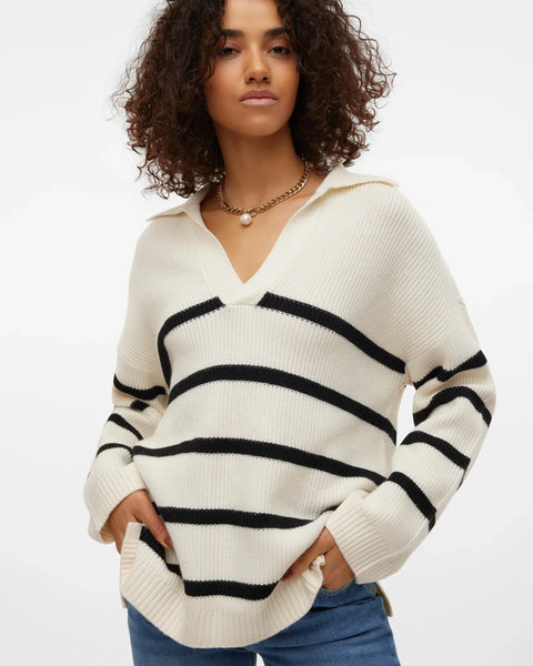 Trendy cream knit sweater with black stripes and cozy relaxed fit for elevated casualwear styling.