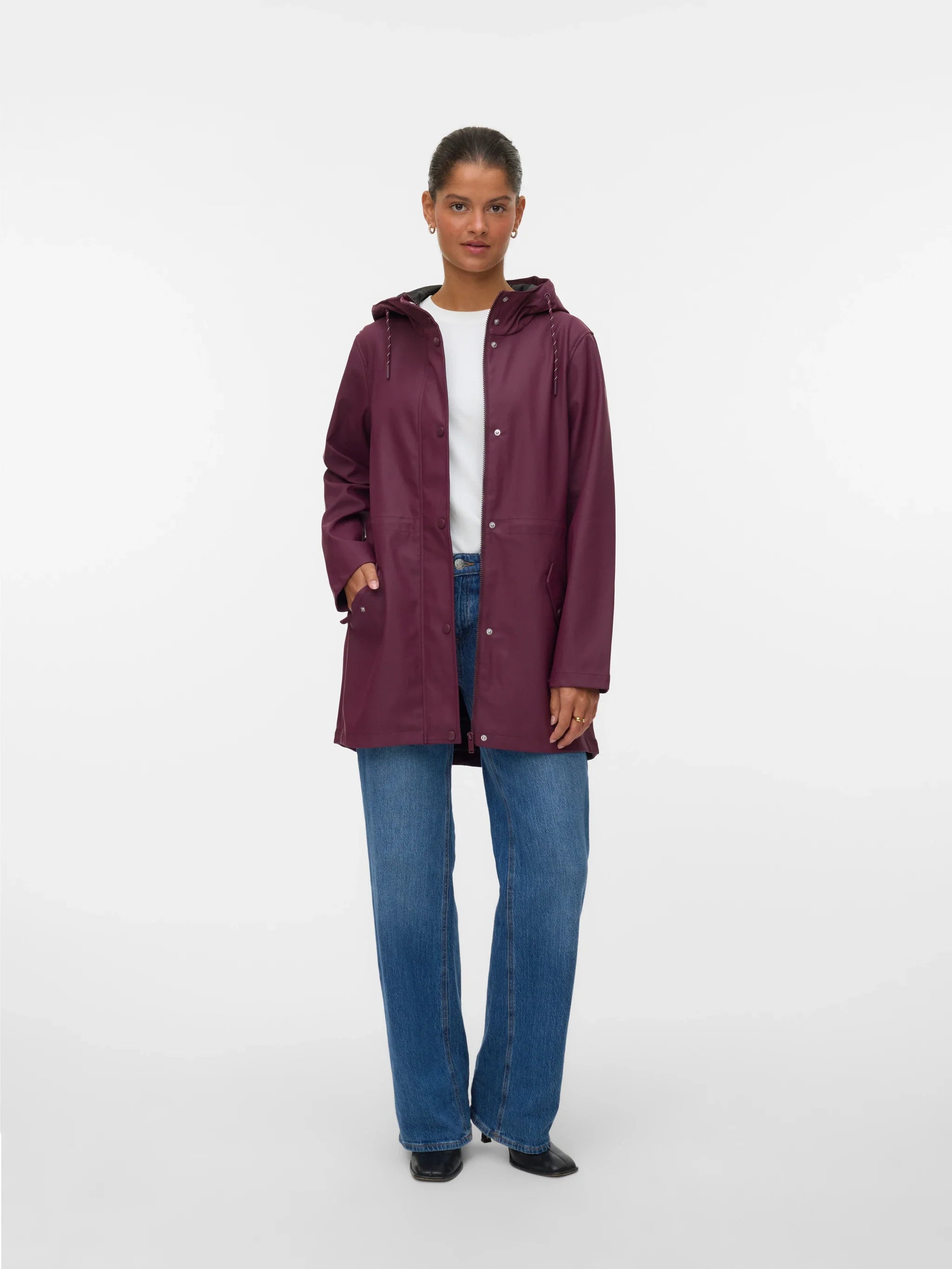 Women’s burgundy hooded rain jacket with flattering adjustable waist for versatile everyday, travel, and commuter outerwear.