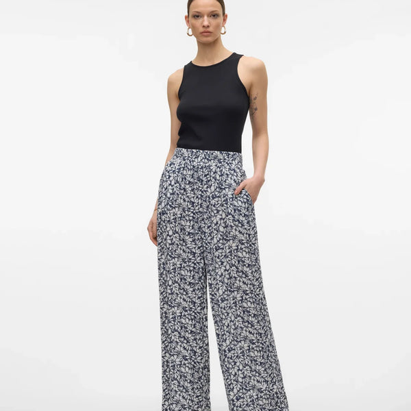 Black and ivory floral pants with breezy wide leg design for elevated casual and vacation outfits.
