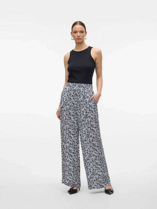 Black and ivory floral pants with breezy wide leg design for elevated casual and vacation outfits.