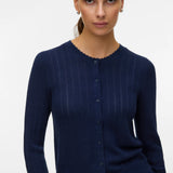 Navy blue lightweight knit cardigan with long sleeves, button front and feminine scalloped detailing for work and everyday outfits.