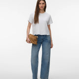 Women's white short sleeve blouse with embroidered floral hem, crew neckline and relaxed fit for elegant everyday and summer style.