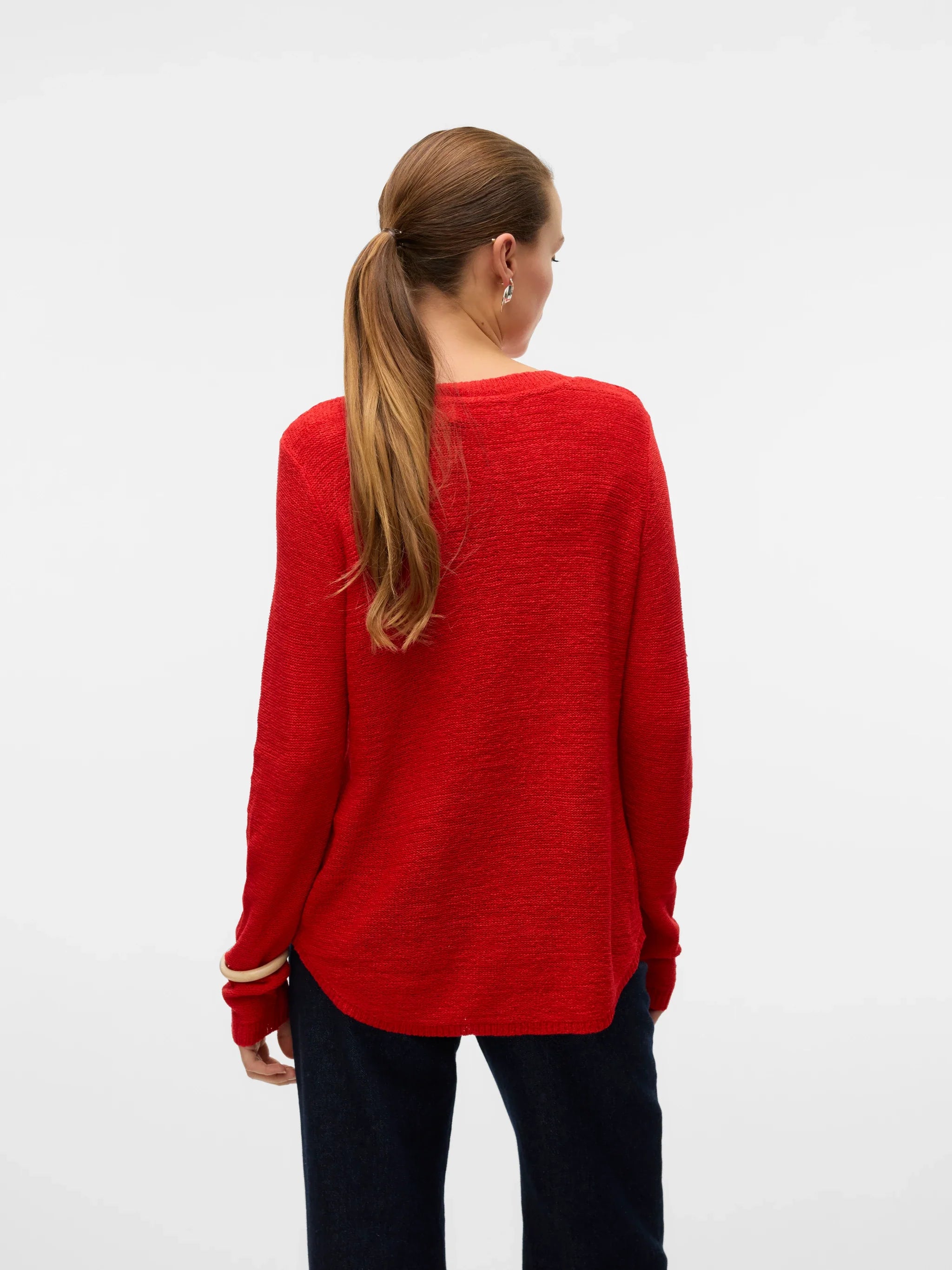 Women's versatile red crew neck pullover with relaxed silhouette and fine knit texture for comfortable work, weekend and transitional outfits.