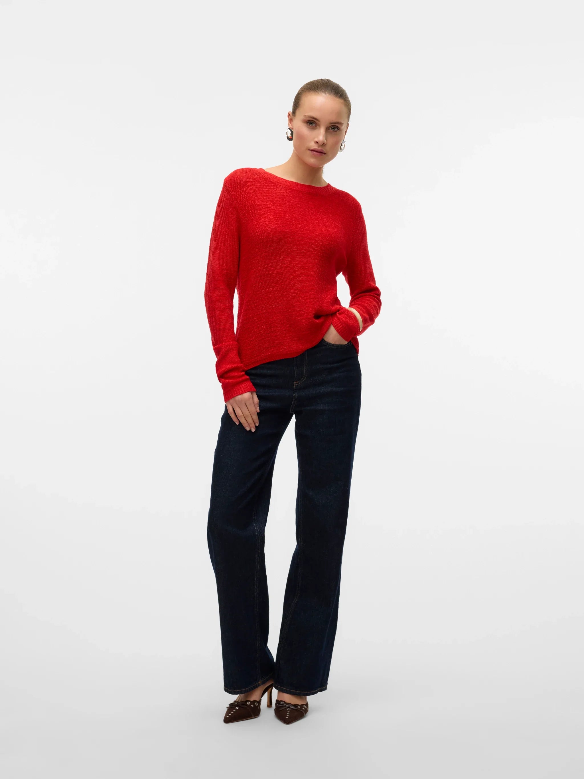 Women's minimalist red knit sweater with long sleeves and lightweight textured finish for capsule wardrobes, travel and everyday styling.