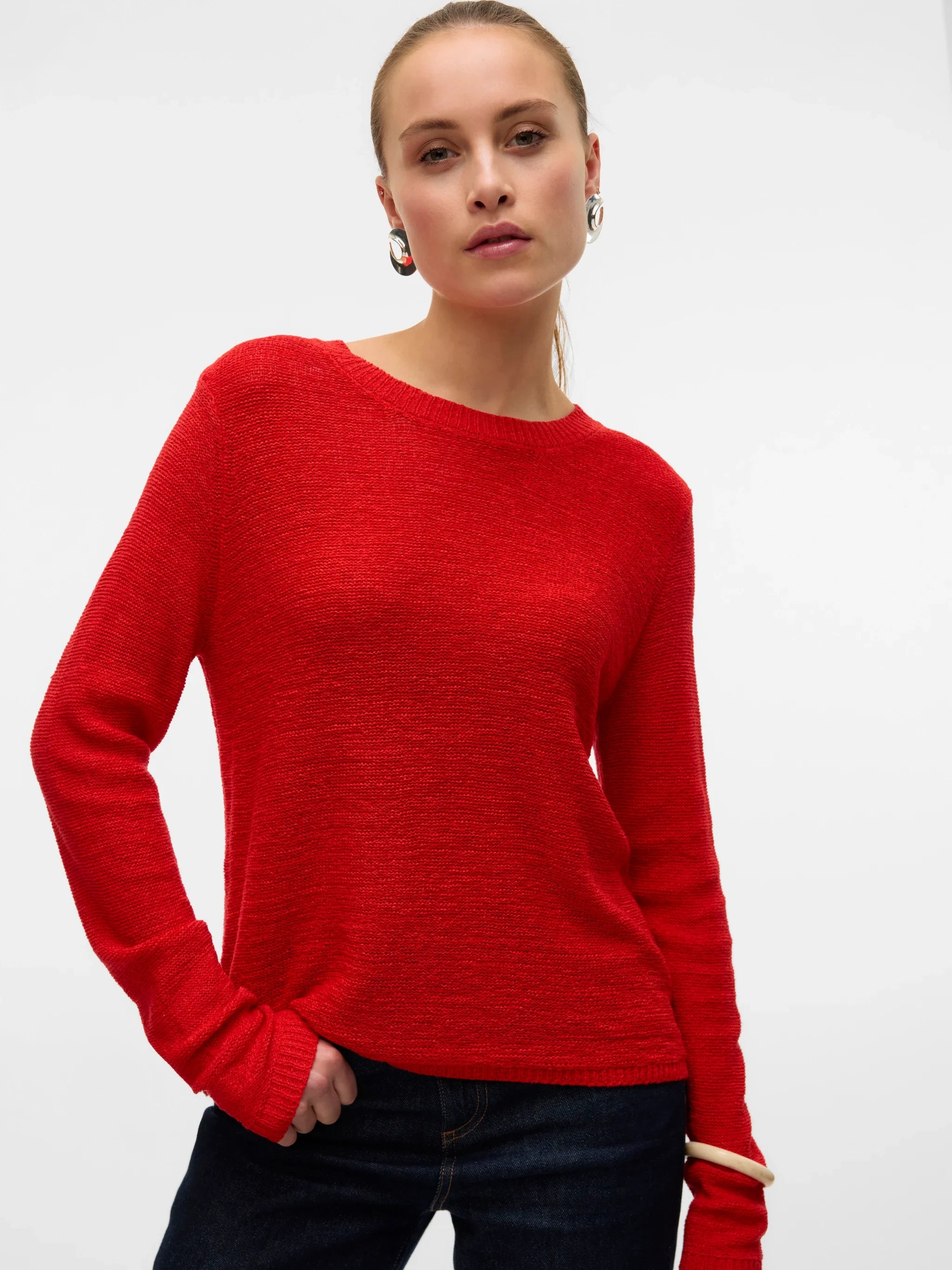 Boutique women's red crew neck knit sweater with long sleeves and lightweight texture for minimalist layering and effortless everyday fashion.