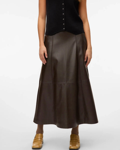Women’s brown faux leather skirt featuring a flattering high waist and A-line midi length for elevated everyday style.