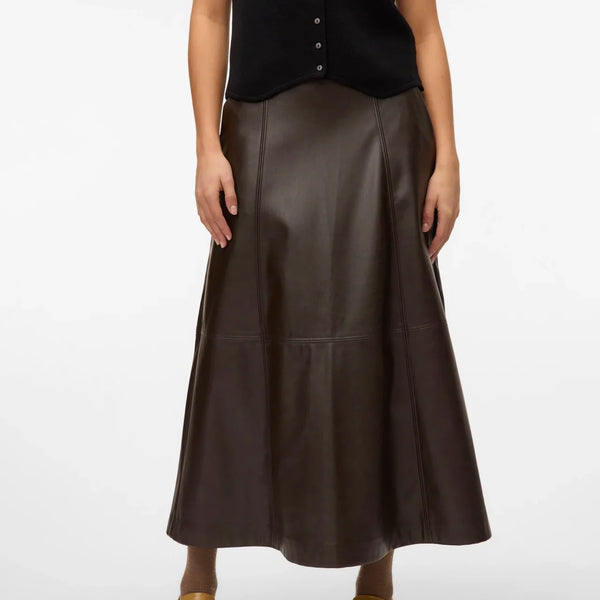 Women’s brown faux leather skirt featuring a flattering high waist and A-line midi length for elevated everyday style.