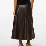 Women’s brown faux leather midi skirt with flared A-line silhouette for trendy outfits with boots and knitwear.