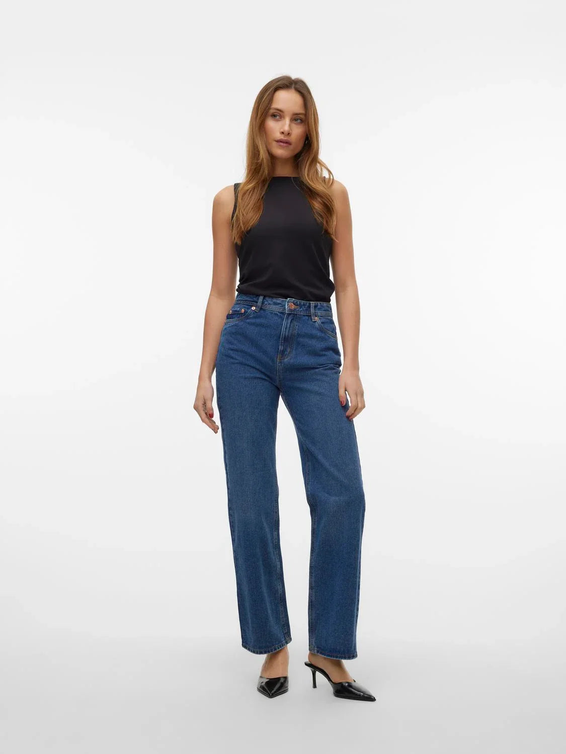 Women’s relaxed fit jeans in medium-dark denim wash with wide leg styling and comfortable high-waisted construction.