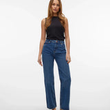 Women’s relaxed fit jeans in medium-dark denim wash with wide leg styling and comfortable high-waisted construction.