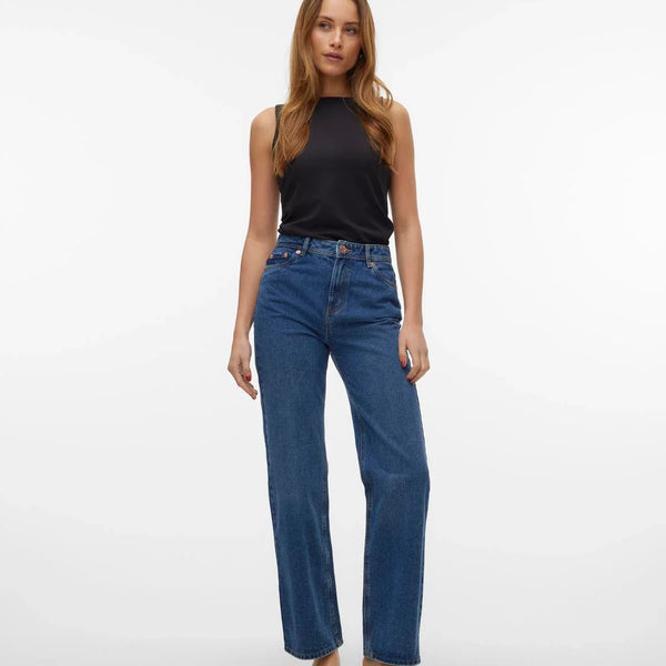 Women’s relaxed fit jeans in medium-dark denim wash with wide leg styling and comfortable high-waisted construction.