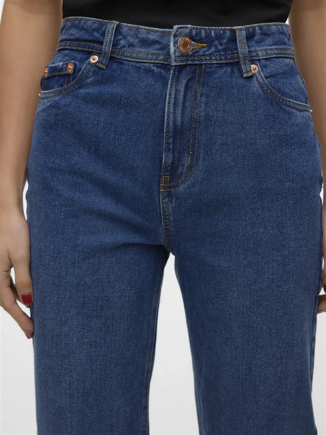 Fashion-forward women’s blue denim pants with straight wide leg fit and clean minimalist vintage jean aesthetic.