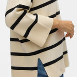 Women’s relaxed fit striped knit top with wide sleeves and classic black stripe pattern for cozy chic everyday wear.