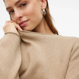 Chic relaxed-fit beige sweater for women featuring a clean neckline and soft lightweight knit texture.