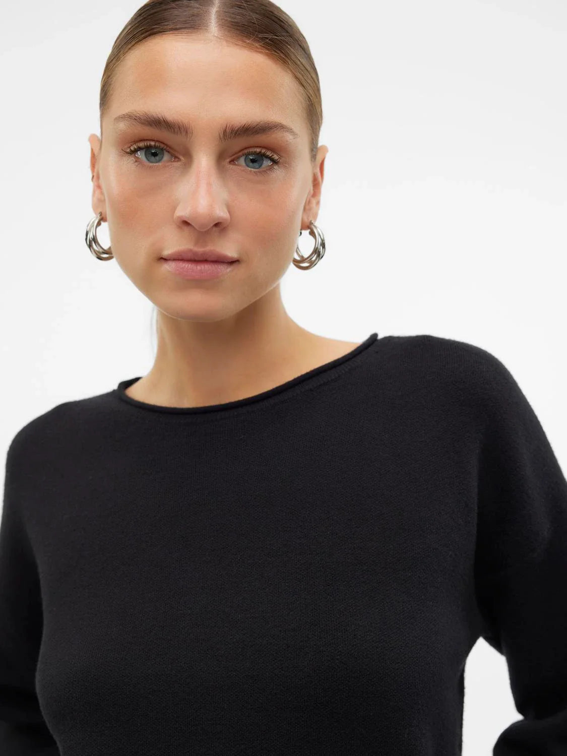 Women’s modern neutral sweater with lightweight knit fabric and effortless off-duty chic styling.