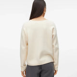 Back view of Women’s lightweight cashmere-inspired sweater in cream off-white with relaxed fit and timeless capsule wardrobe appeal.