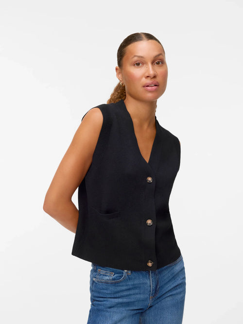 Minimalist women’s black knitwear vest with clean modern silhouette