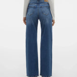 Back view of timeless blue denim jeans with high-rise waist and relaxed straight leg fit for modern women’s fashion.