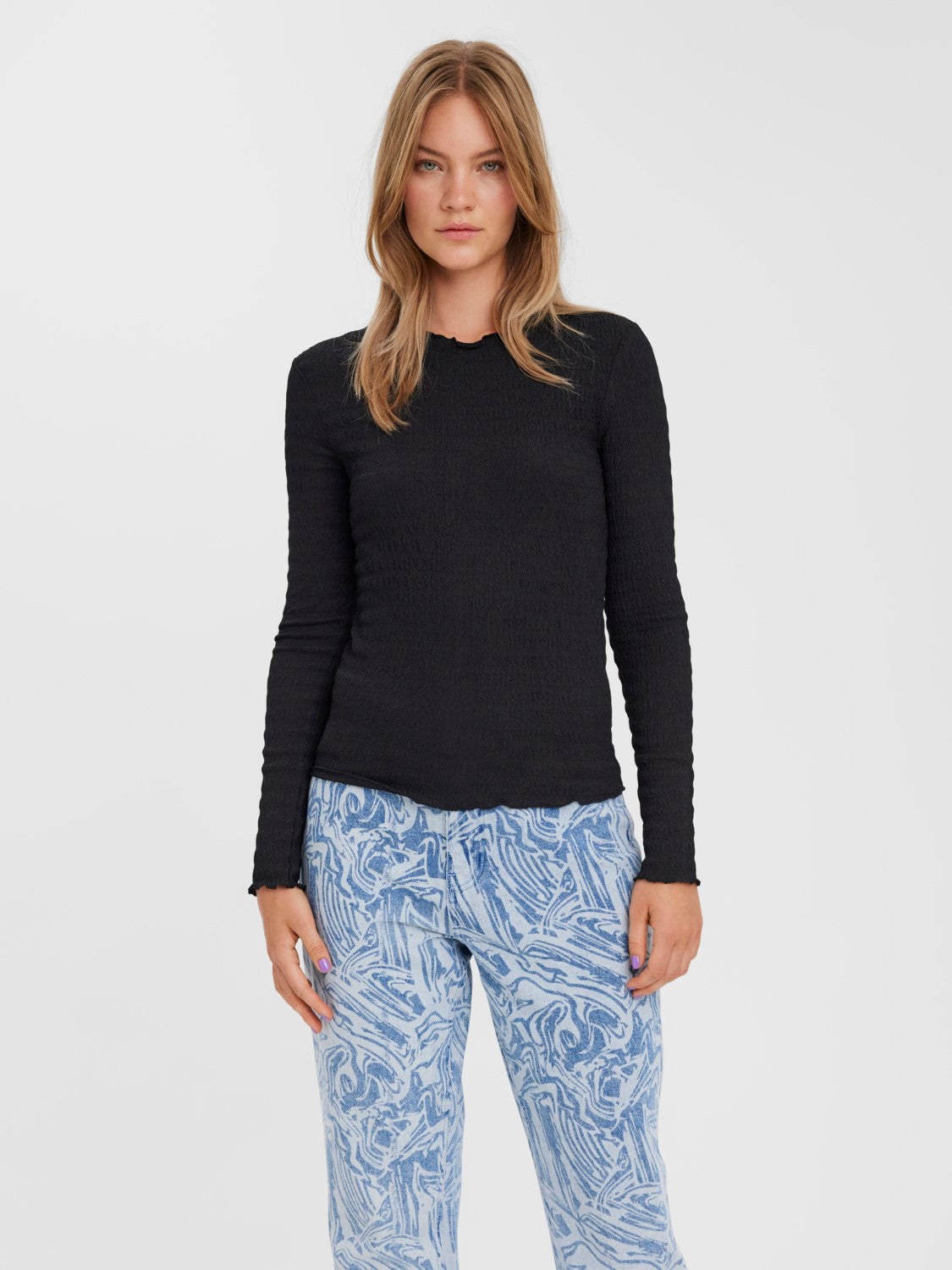 Stretch ribbed black shirt with long sleeves and flattering body-contouring fit.