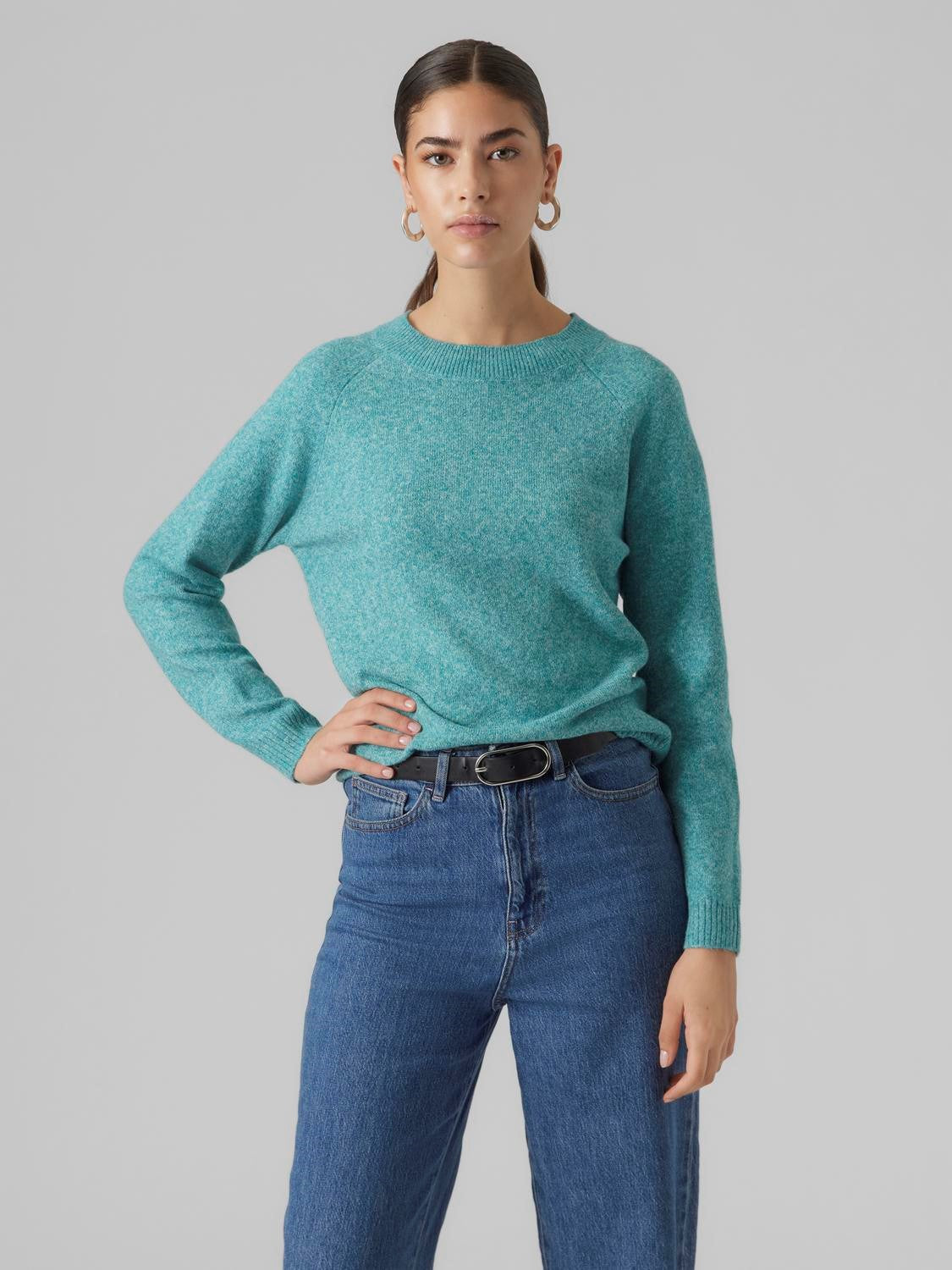 Chic light teal long sleeve sweater for women with cozy knit texture and effortless casual style.
