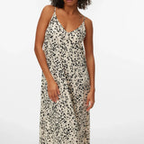 Women's elegant monochrome printed dress with flowing movement, effortless silhouette, and fashionable safari-inspired design for every season.